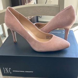 Pink suede pumps